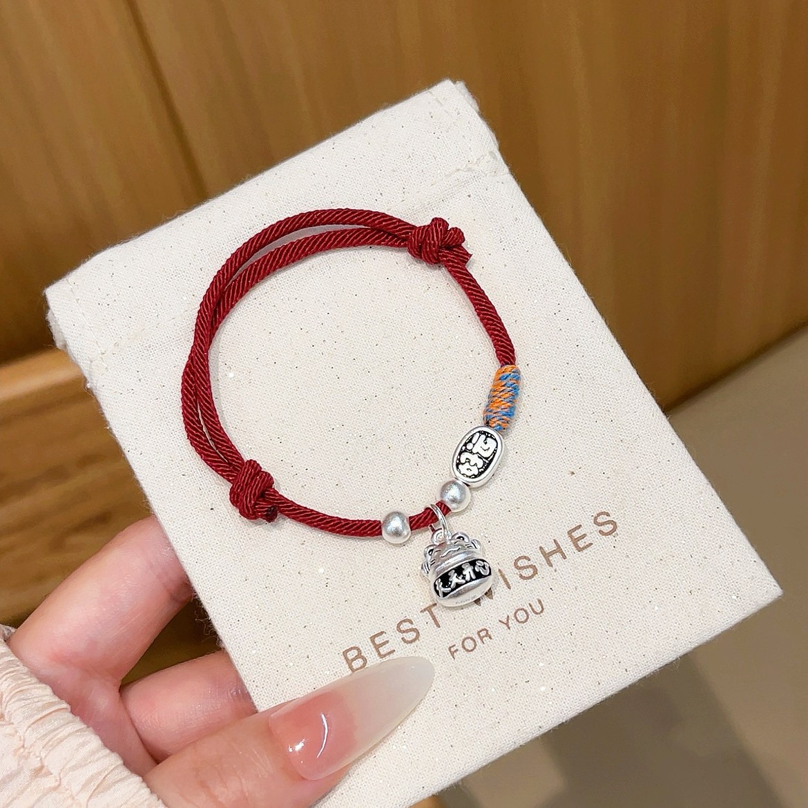 "Everyday Happiness Maneki Neko Zodiac Year Antique woven red rope bracelet, national trend Niche design, couple copper plated with hidden silver. details Picture