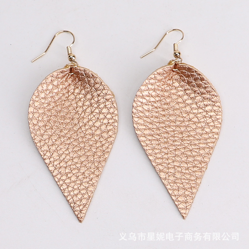 Fine-grained pu leather leaf style earrings, popular in Europe and America. Simple and exquisite pu leather leaf earrings, cross-border e-commerce supply Item Picture