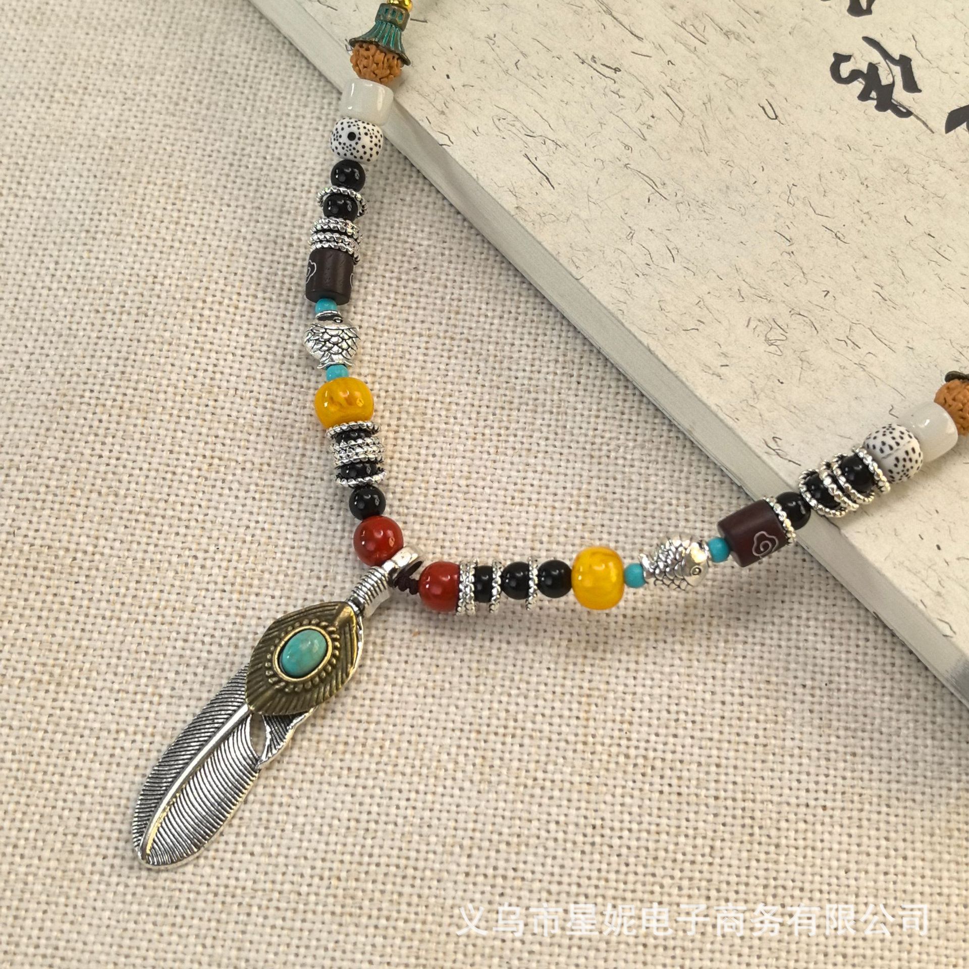 原创复古民族风尼泊尔象神项链女合金羽毛吊坠百搭九宫八卦毛衣链