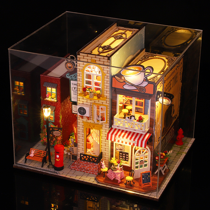 The miniature street scene model illuminated by lights, including bookstores, coffee shops, mailboxes, street lamps, benches, dormitories, decorative lights and tables for setting up stalls Application Scenario