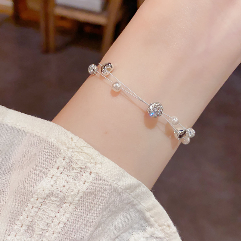Verano nuevo lleno de diamante bola bola perla doble línea de pesca pulsera temperamento moda simple luz diseño de lujo sentido de la mano accesorios