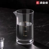 Hotel wine dispenser with scale, wine set with scale, no-handle wine dispenser, glass wine measuring vessel, dining table details Picture