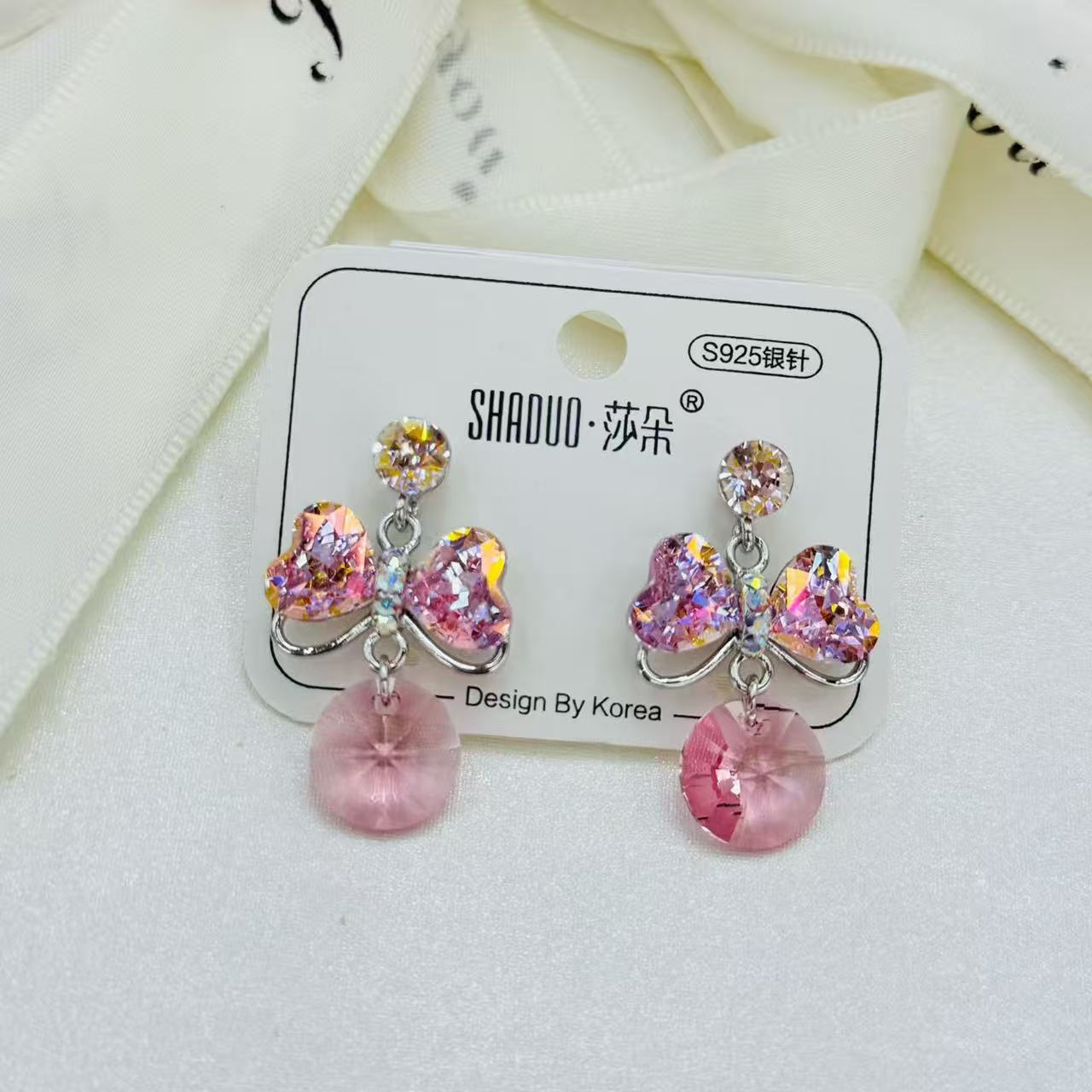 S925银针奥地利水晶蝴蝶结耳环女韩系闪亮锆石流苏耳饰时尚百搭饰