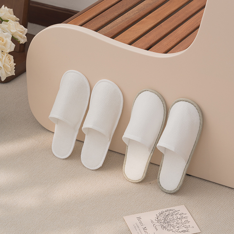 Wholesale of cotton and soft fabric disposable slippers for hotels, home hospitality, all-season breathable, anti-slip thickened soles for homestays and hotels