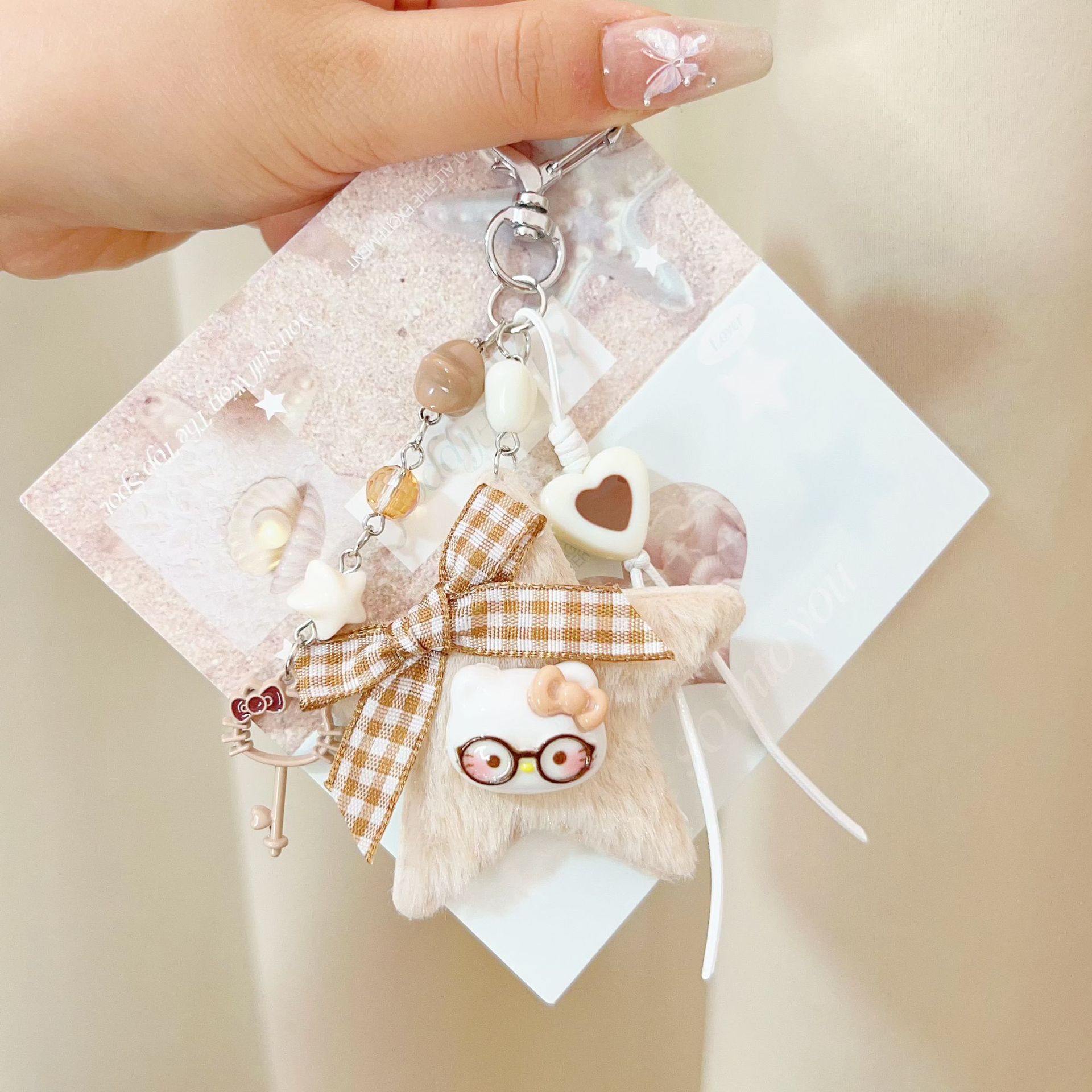 原创新款卡通五角星包挂咖色系猫咪钥匙扣百搭手工编织包挂件批发