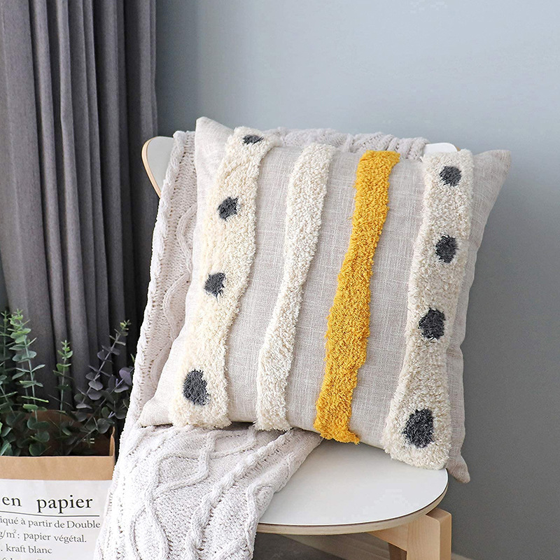 The pillow cover features printed patterns with logos, and the towel is embroidered with stickers. The pillow is custom-made with a simple and creative design for car use details Picture