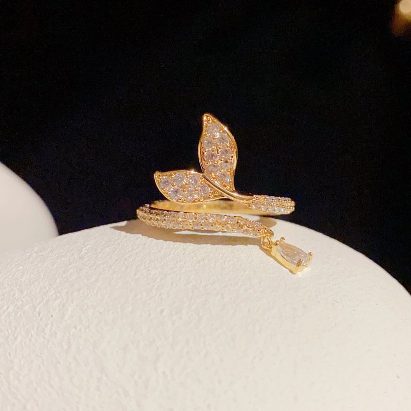 Wholesale of Japanese and Korean niche design, high-end, light luxury, exquisite micro-inlaid zircon fishtail ring, open ring women's accessories
