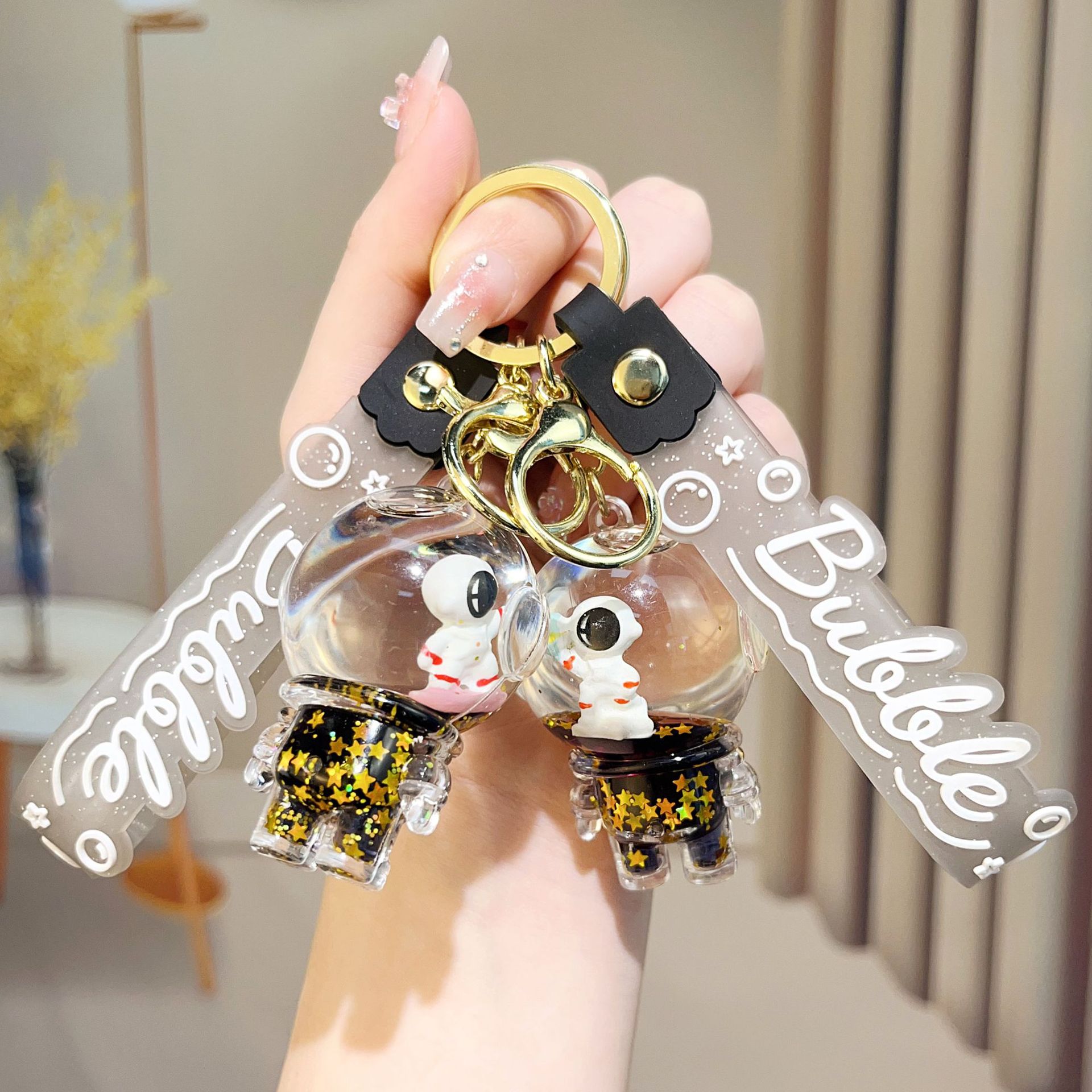 亚克力入油流沙爆闪宇航员太空人钥匙扣精致液体流沙挂件货源