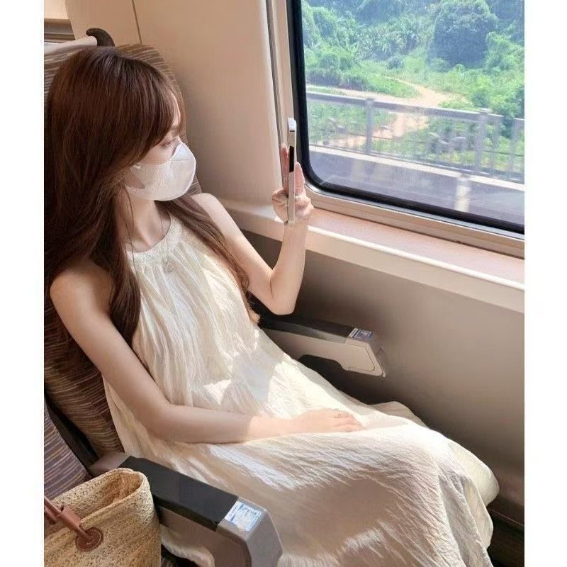 The fabric texture of the white sexy halter dress for women's clothing Application Scenario