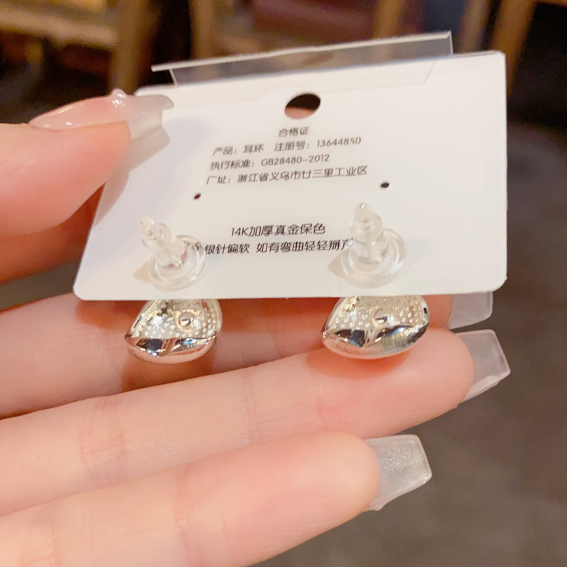 s925银针气质时尚简约金属三角形八芒星耳钉小众轻奢设计耳环批发详情图4