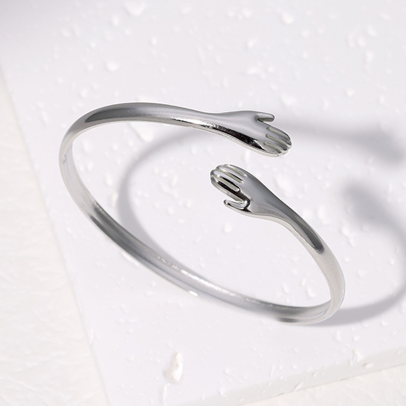 Cross-border European and American titanium steel bracelet, open embrace palm, unique and niche bracelet, simple and non-fading stainless steel bracelet Application Scenario