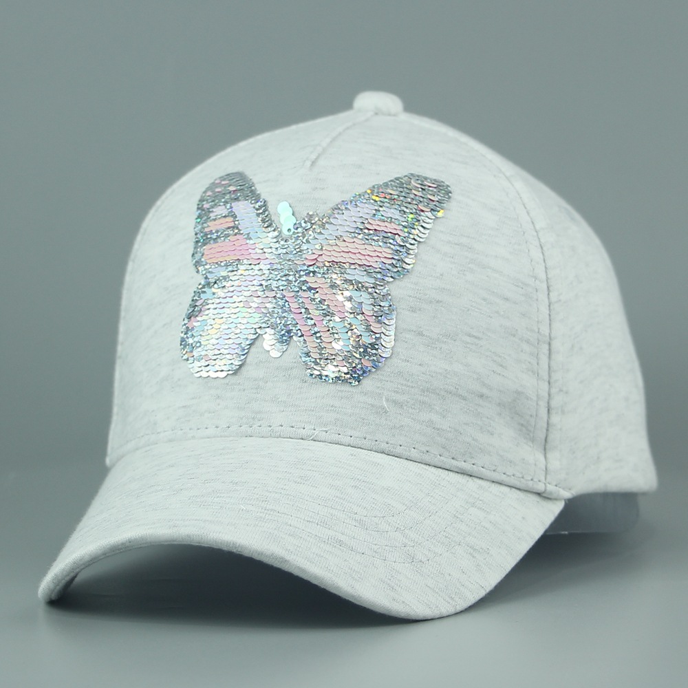The children's caps from the cap factory are made of solid-color cotton with butterfly sequins, sunshade and cute baseball caps. They are printed and breathable for spring and summer Specification image
