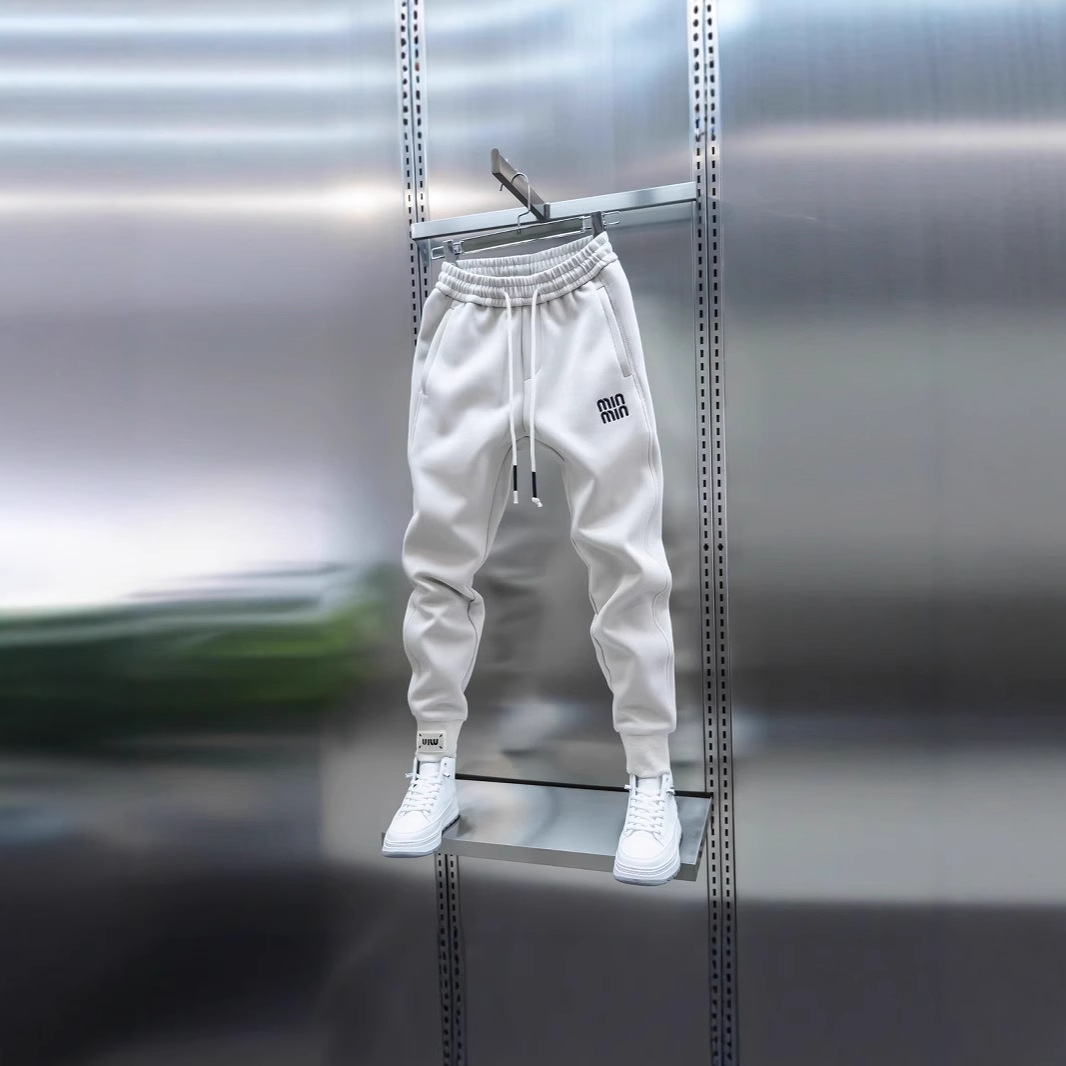 Trendy men's solid-color sports sweatpants, simple embroidered patchwork tight-fitting Harem pants, elastic elastic waisted skinny pants Item Picture