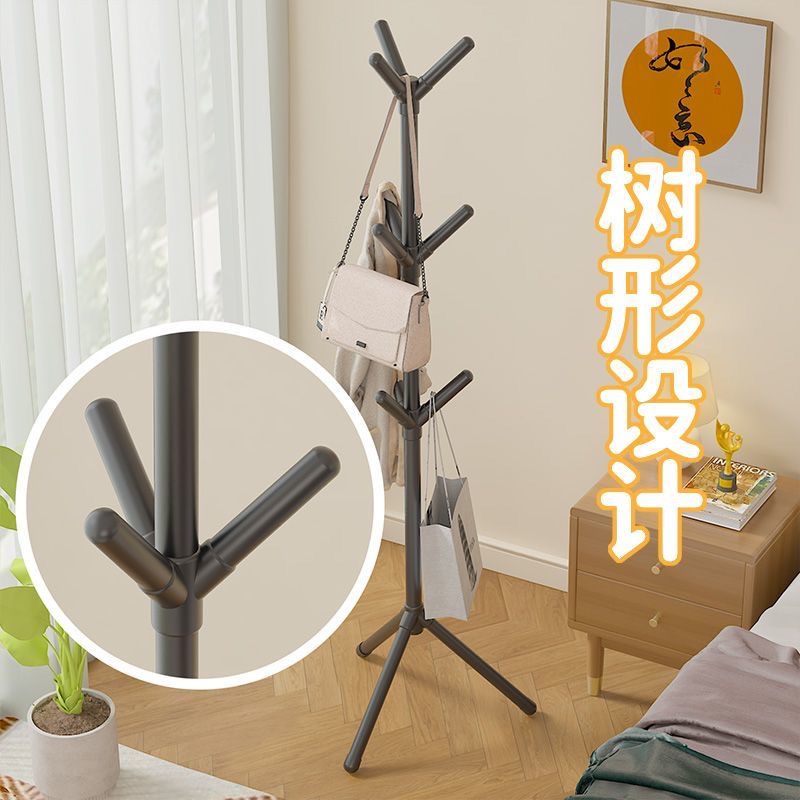 Wholesale of simple coat racks, tree-shaped floor-standing clothes hangers, bedroom household vertical clothes hanger rods, clothes hanging bags, storage racks details Picture