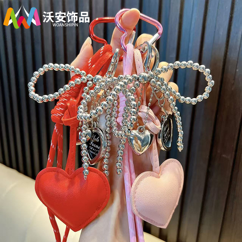PU皮质爱心钥匙扣挂件女生蝴蝶结包包挂饰手机挂链爪机小礼品批发
