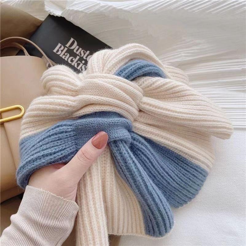 This women's autumn and winter scarf exudes a sense of high-end warmth and warmth. It features a color-blocked knitted cross yarn that is fashionable and cute. It's a winter scarf for young girls Specification image