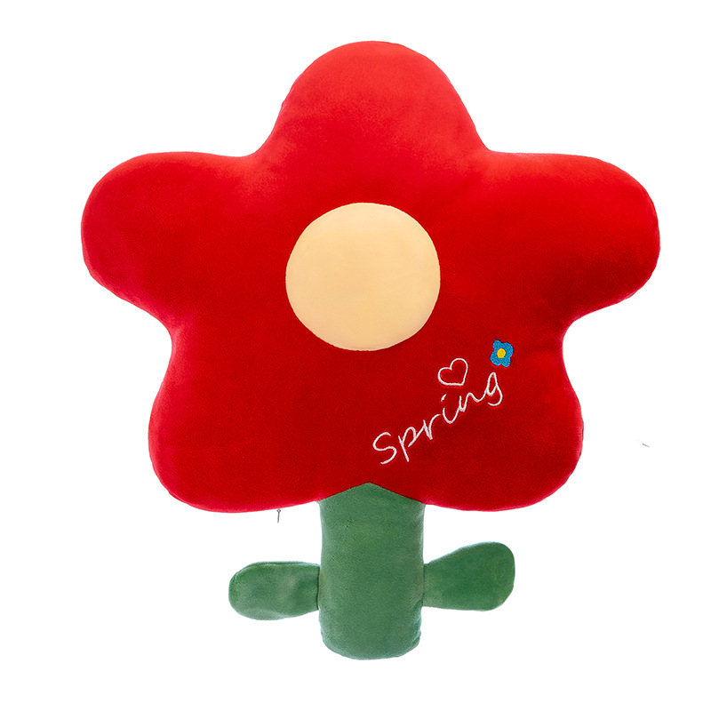 وكانت الزهور الحمراء على على السرير مع دمى محملة بلعب من الصوف Item Picture