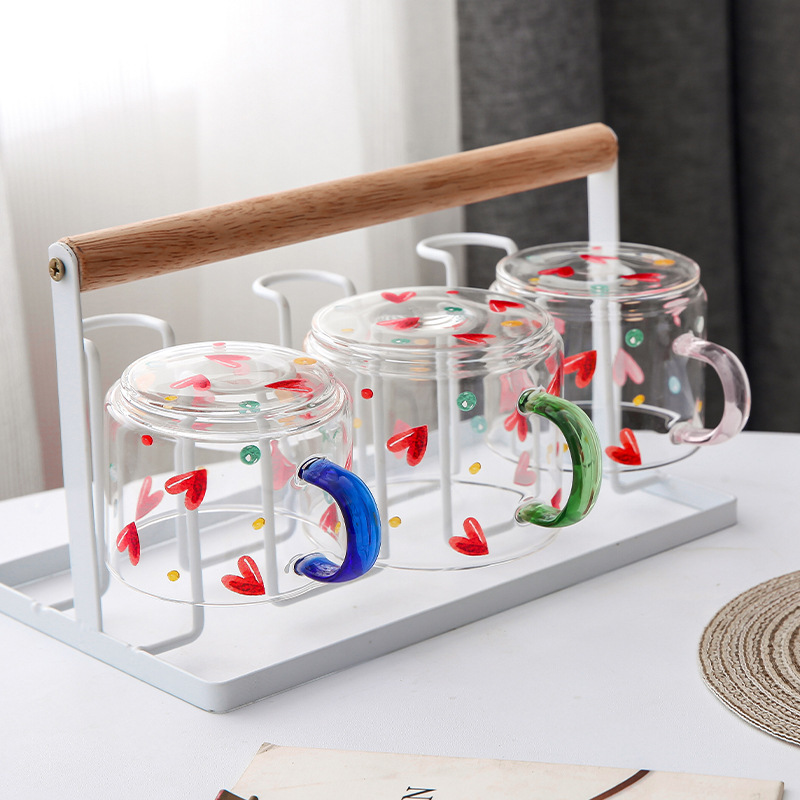 Transparent glass cups with creative heart-shaped milk breakfast cups, office household tea cups, and water cups with handles details Picture