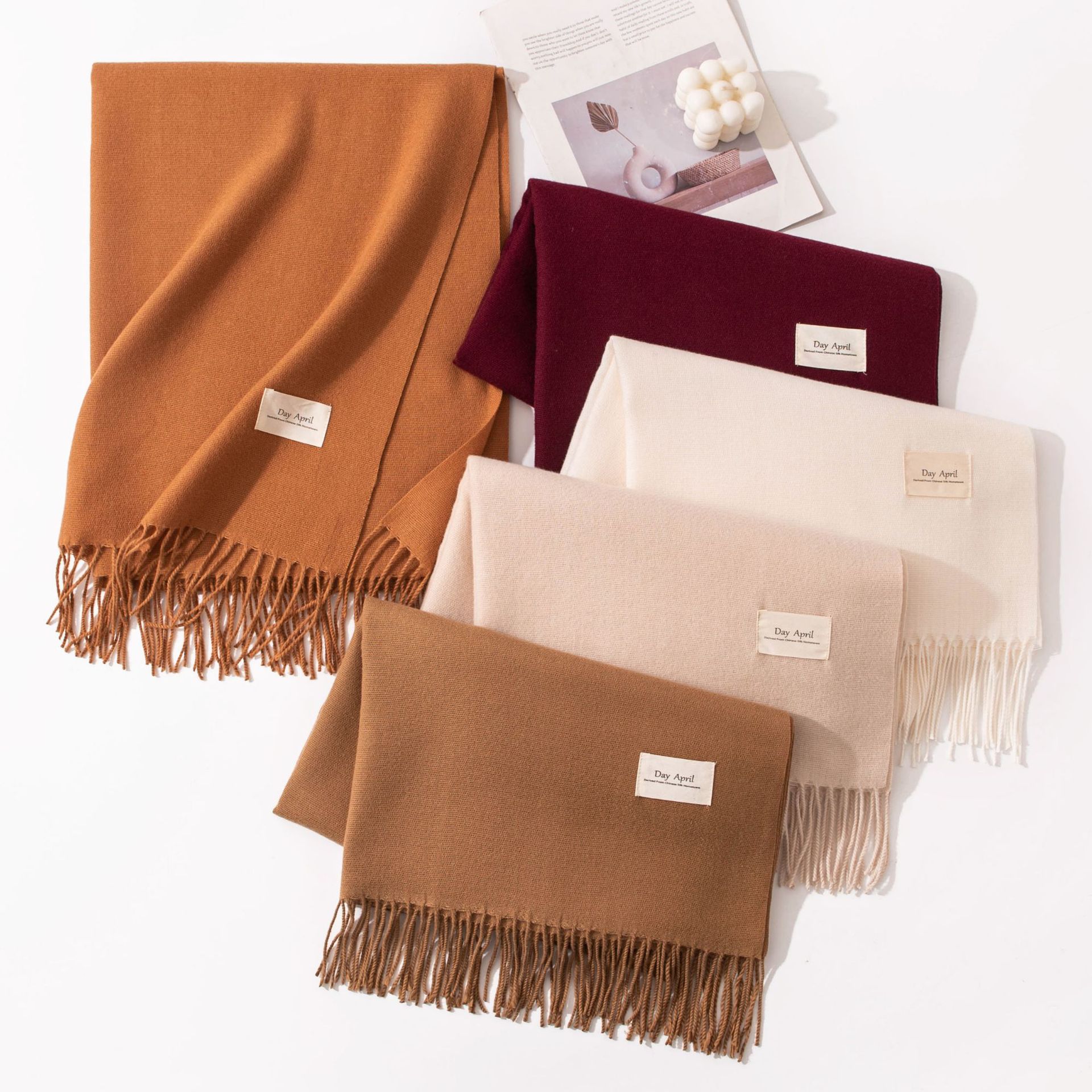 The 2025 new style of autumn and winter Korean-style atmosphere scarf is a versatile choice for women. It is a solid-color warm faux cashmere scarf and a shawl details Picture