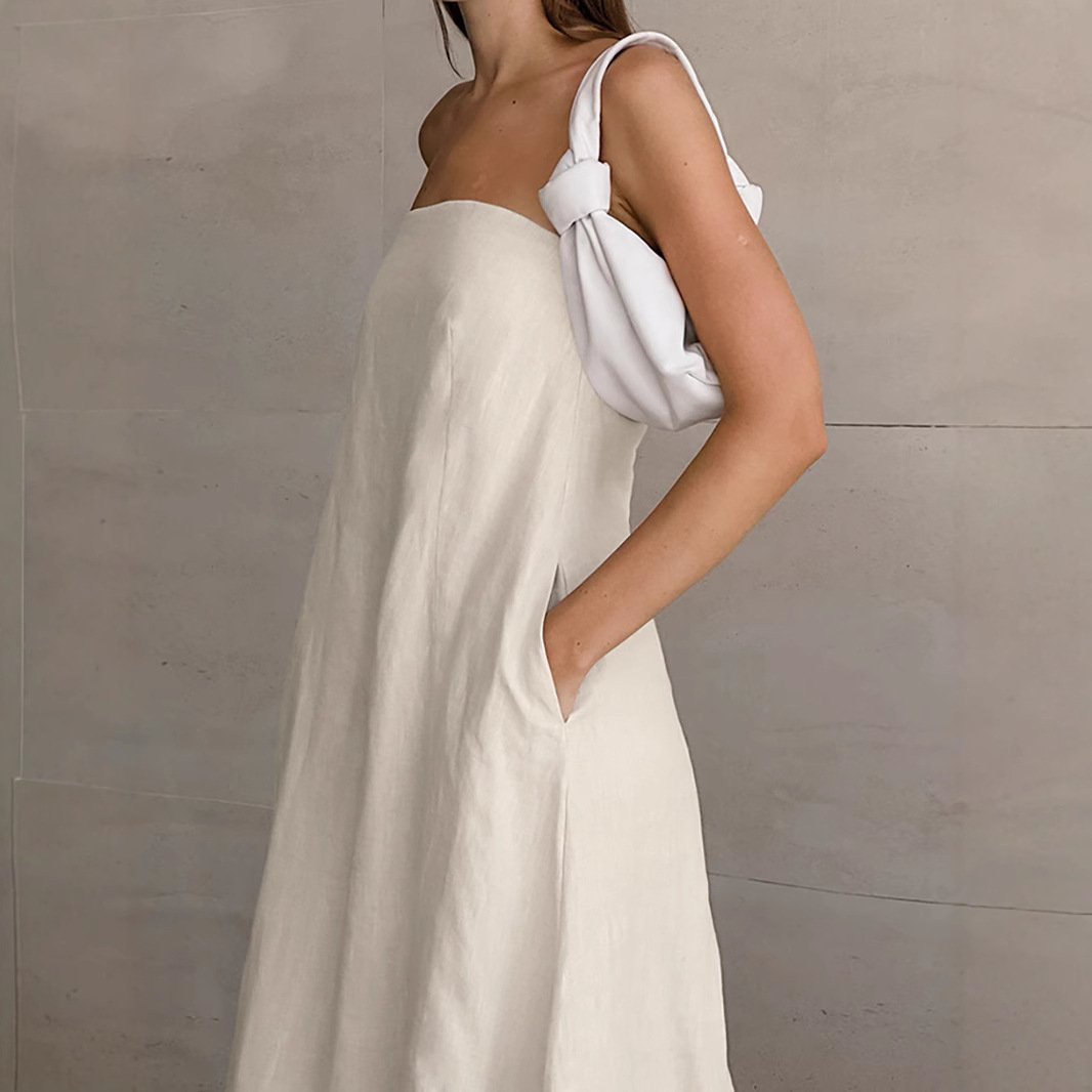 A simple and stylish European and American design dress, a new cross-border slimming and elegant strapless solid color long dress for women in 2025 details Picture