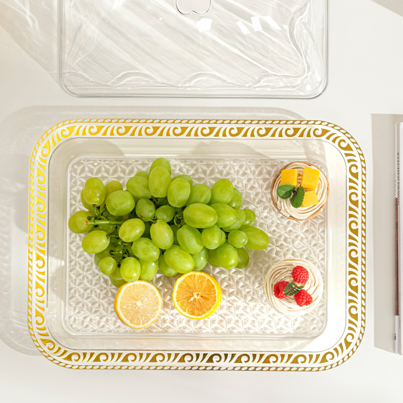 A rectangular plastic tray for home use, light luxury and high-end. It is used as a tea tray for the living room and a cake and pastry tray for the dining room to hold tea cups and water Application Scenario