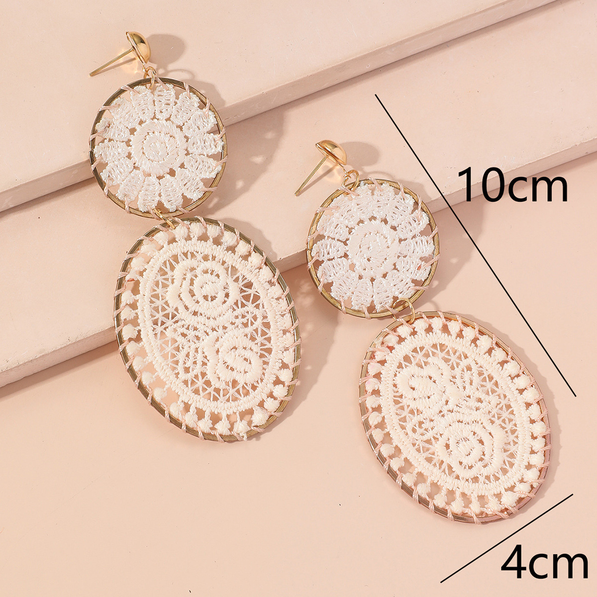 The new fashionable and exaggerated earrings exude a feminine charm and a sense of sophistication. They are woven and hollowed-out retro earrings details Picture