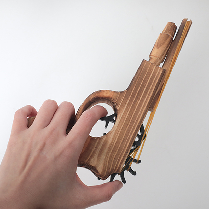 Wooden toy gun, children's traditional nostalgic battle game, boy's birthday gift, educational rubber band wooden gun Application Scenario
