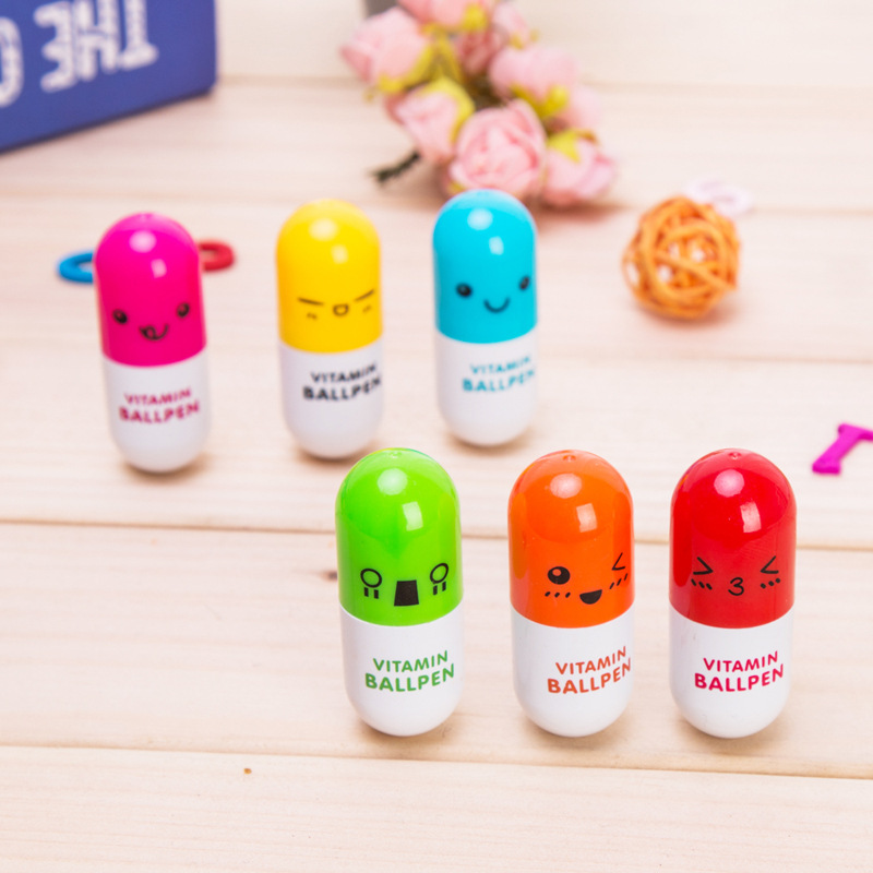 P-0128 Simple, new, cute cartoon smiling face telescopic capsule Ballpoint pen pill Pen stationery details Picture
