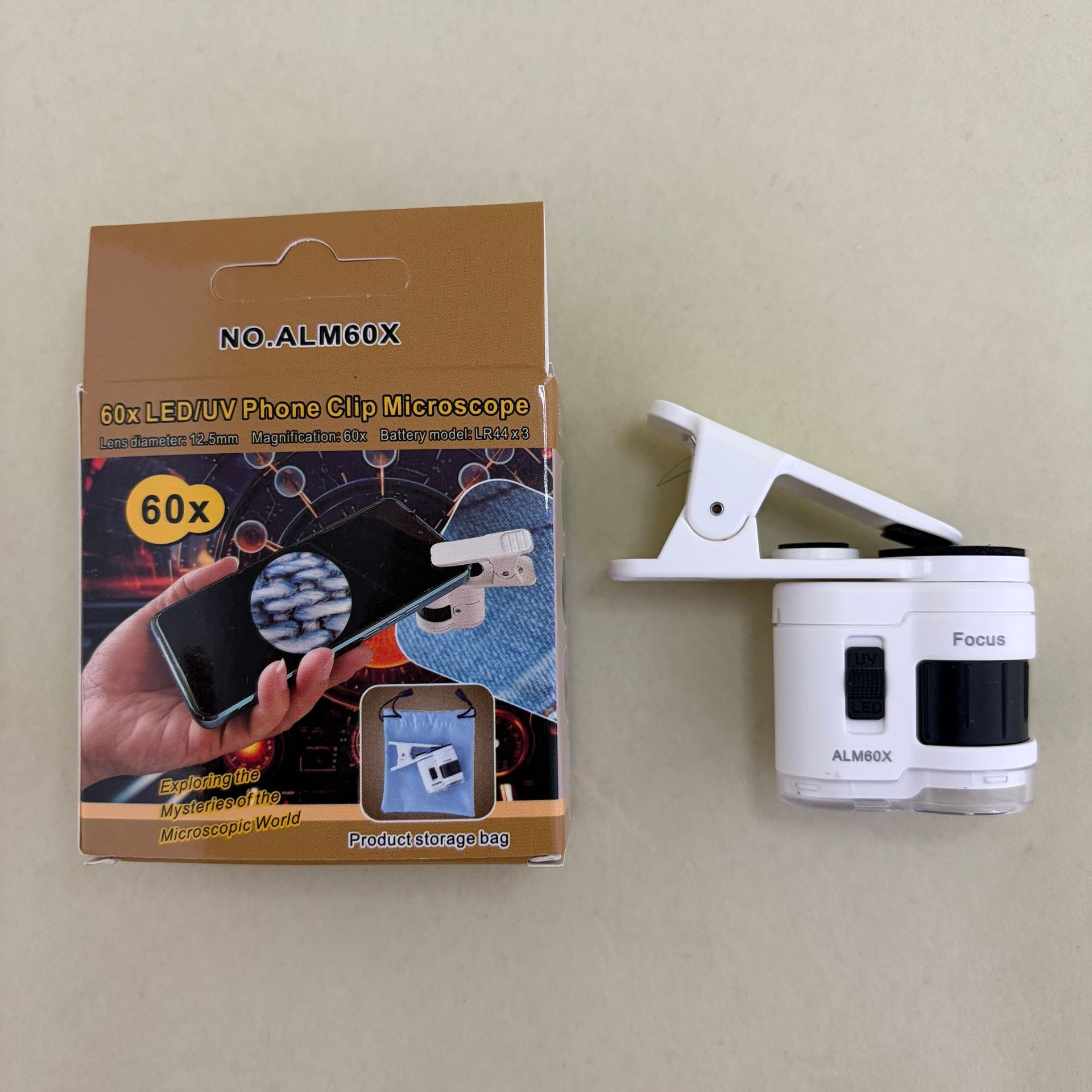 New 60x portable mini microscope with phone holder magnifying glass for jade calligraphy and painting appraisal, equipped with LED ultraviolet light Application Scenario