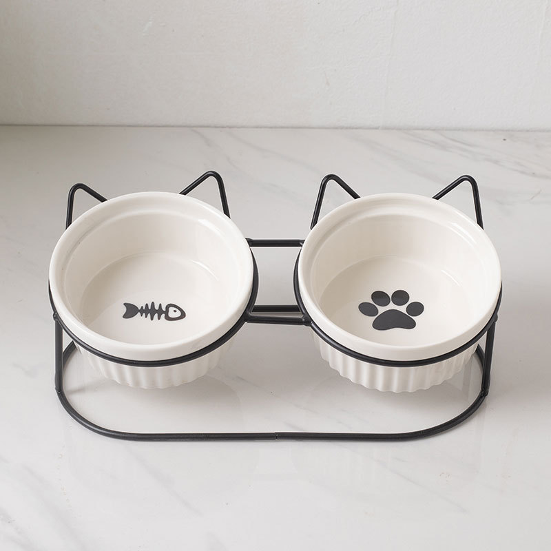 The intelligent cat bowl rack, a pet product, is a special automatic feeder for cats with adjustable height and anti-tipping design Specification image