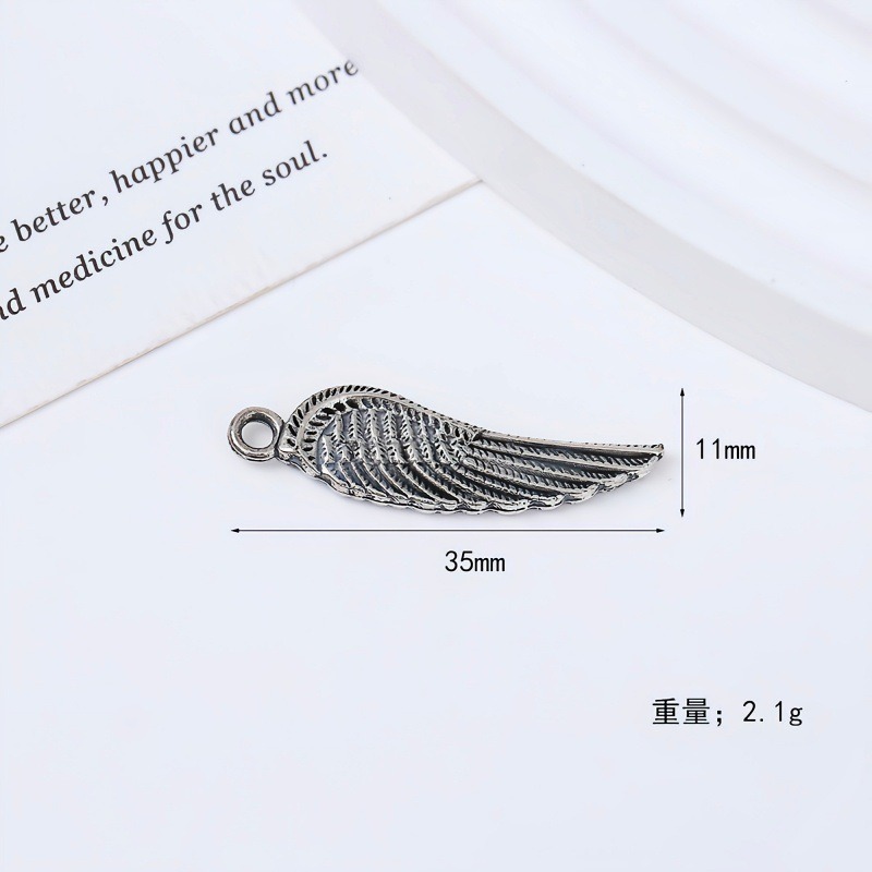 Personalized retro leaf wing metal pendant, trendy hip-hop necklace pendant, diy bag, keychain details Picture