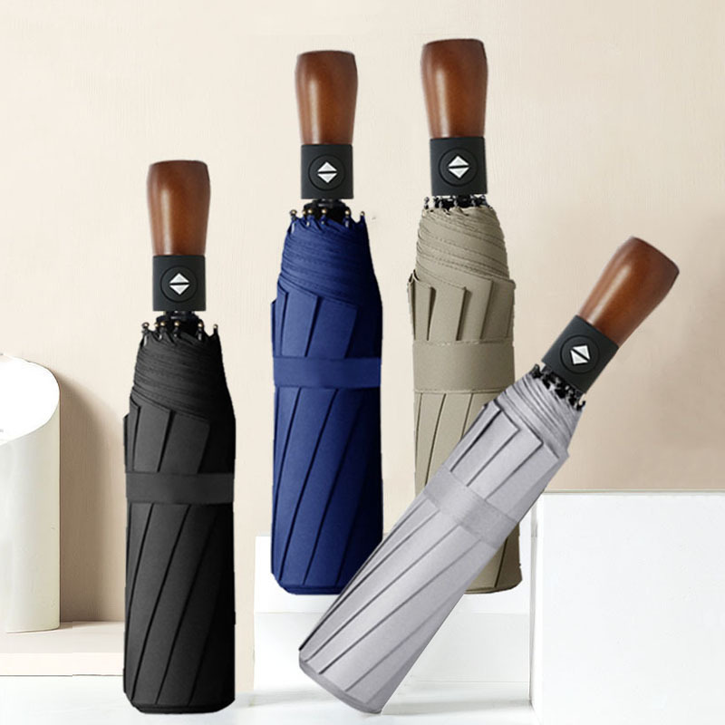 10-bone automatic three-fold umbrella, high-end wooden handle men's business folding umbrella, wind-resistant black rubber gift umbrella, advertising umbrella details Picture