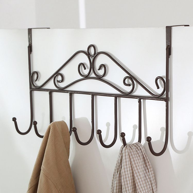 A creative rack for hanging clothes and hats without drilling holes, hooks at the back of the door, nails, clothes hangers on the door, or installation on the back of the door details Picture
