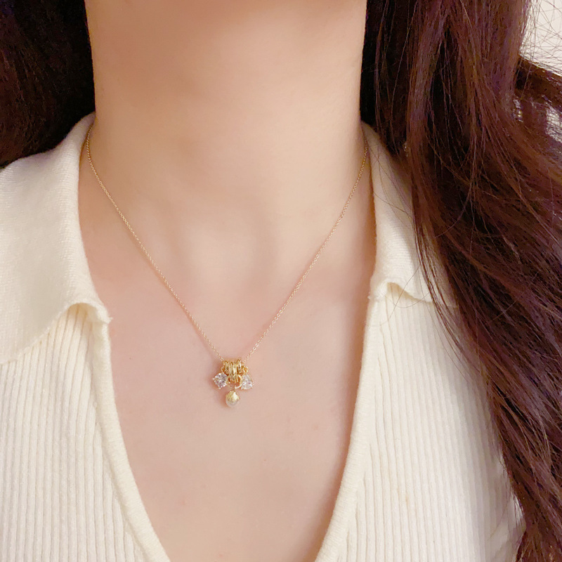 European and American cross-border personalized and fashionable design sense diamond-encrusted water drop pearl pendant necklace, simple and elegant, super sparkling collarbone chain details Picture