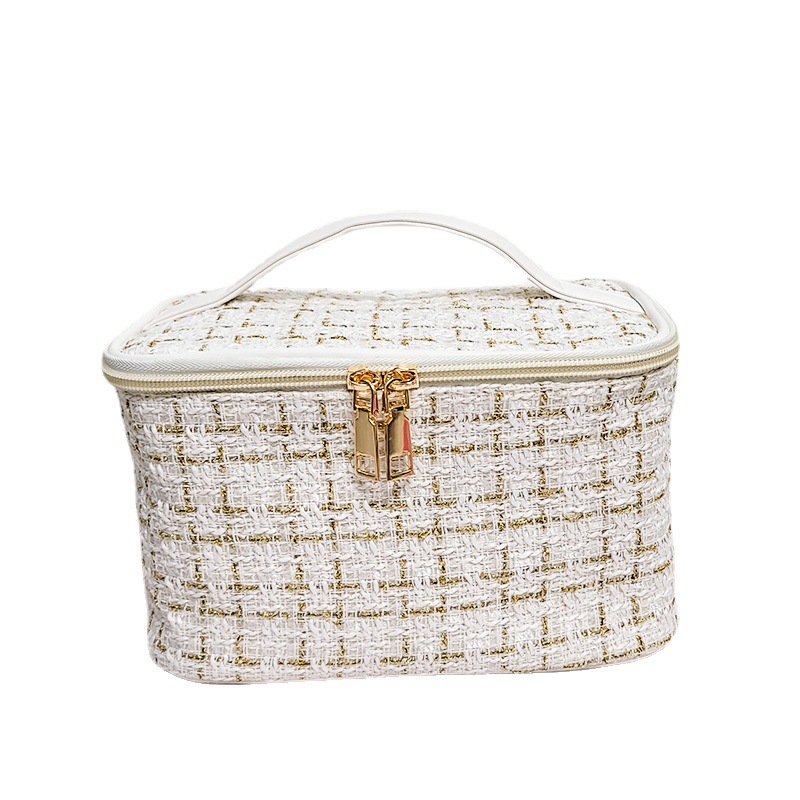 2023新款小香风高颜值时尚化妆包大容量便携式手提包化妆品收纳包白底实物图