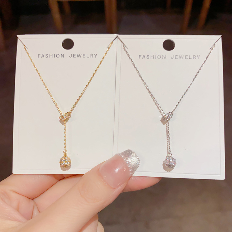 A niche and fashionable design sense diamond ball pull-out tassel necklace, simple and elegant, light luxury, versatile accessory source manufacturer