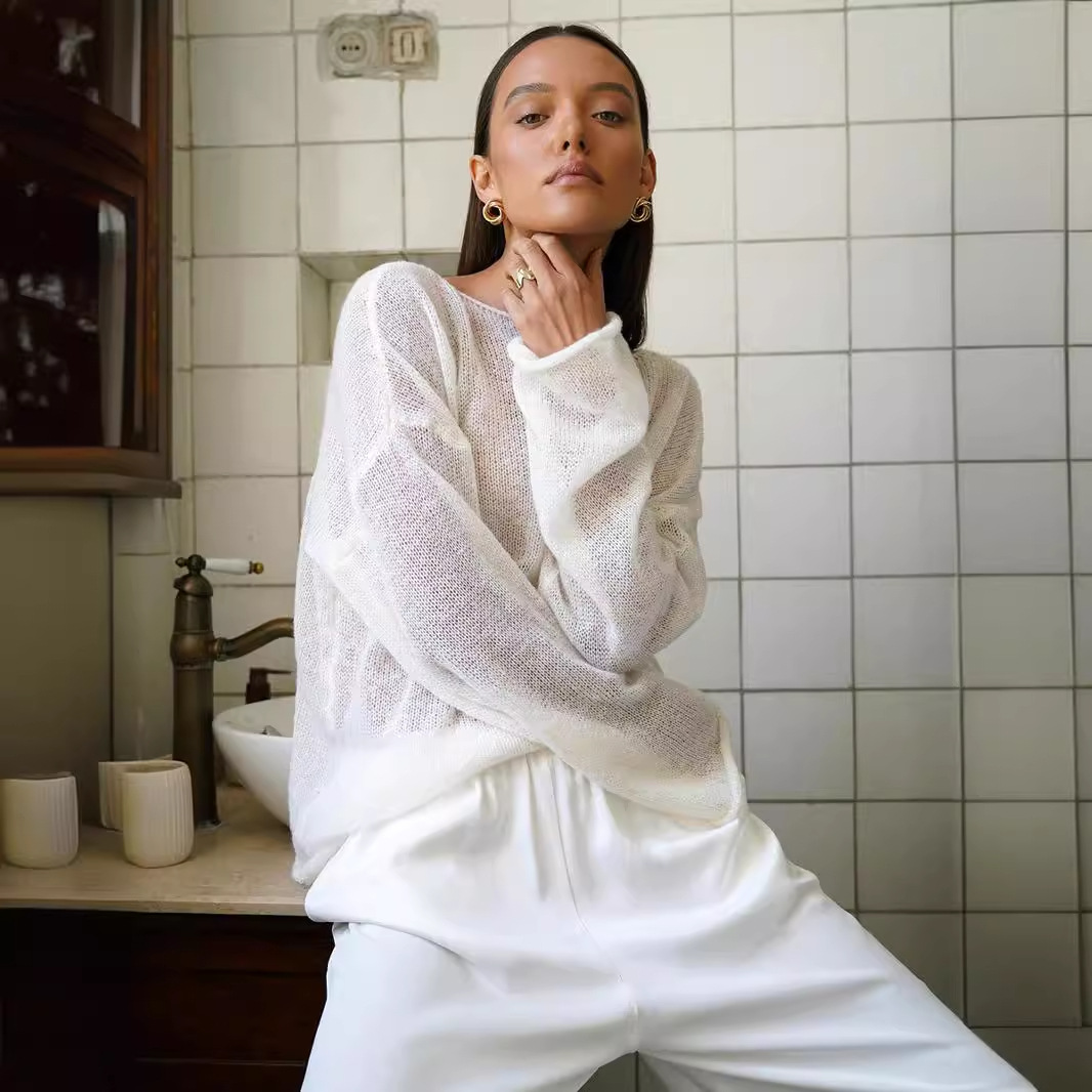 Cross-border hollowed-out knitted sweater, European and American 2025 Spring/Summer new women's see-through thin large round neck flared sleeve knitted T-shirt details Picture