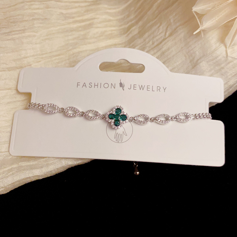 Korean version exquisite and fashionable micro-inlaid zircon four-leaf flower earrings, feminine charm, daily commuting super shiny necklace ring wholesale details Picture