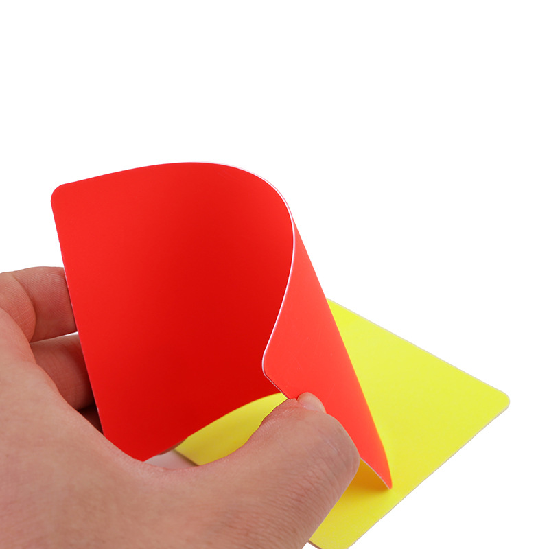 Football referee: Red and yellow cards, yellow and red cards, paper, pencil, leather case. The referee records and penalizes the yellow and red cards Specification image