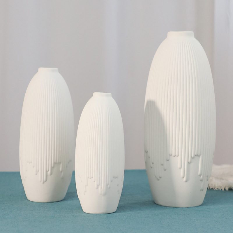 2026 Modern and simple ceramic vase, creative home decoration, unfired white flower arrangement, striped flower vases, desktop business gifts Application Scenario