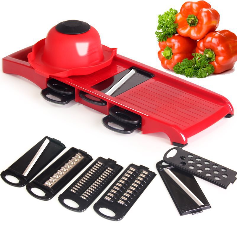 A household kitchen grater for peeling potato shreds and cutting vegetables, a multi-functional grater for peeling red radish shreds and slicing details Picture