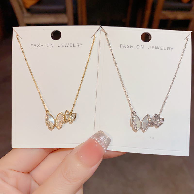 Light luxury, niche and high-end zircon shell butterfly necklace, all-in-one pendant for women, collarbone chain and neck chain wholesale