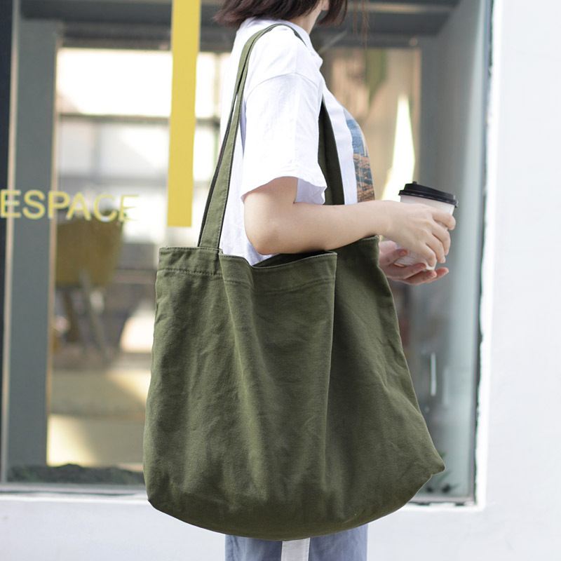 Korean style simple large-capacity canvas bag, popular light solid color single-shoulder women's bag, casual retro shopping bag handbag details Picture