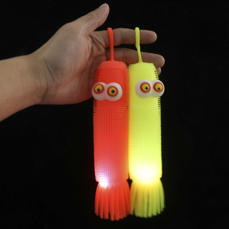 Luminous protruding eye corn caterpillar protruding eye octopus venting ball toys, night market shining street stall toys wholesale Application Scenario