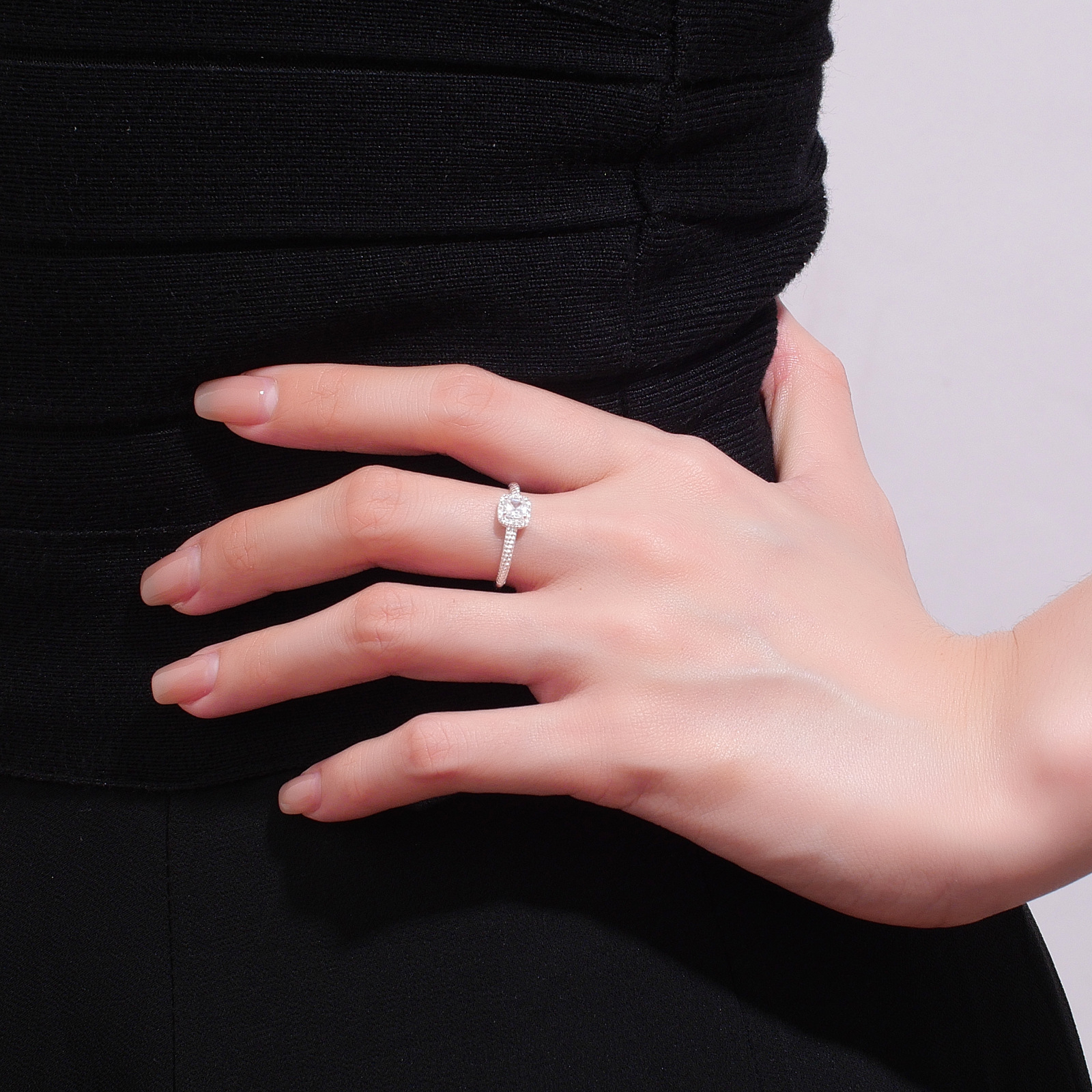 Wholesale of small square sugar ring for women, featuring a light luxury design with square diamonds and a simple, super shiny white diamond ring Application Scenario