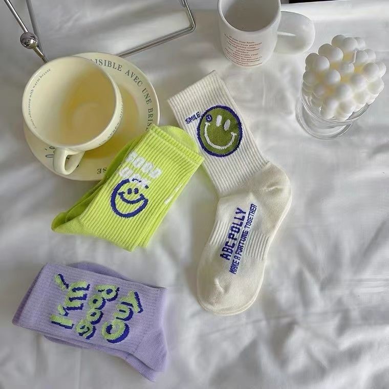 Spring and autumn socks, smiling face three-dimensional fluorescent green ins trendy long socks, men's and women's colorful versatile school mid-calf socks Specification image