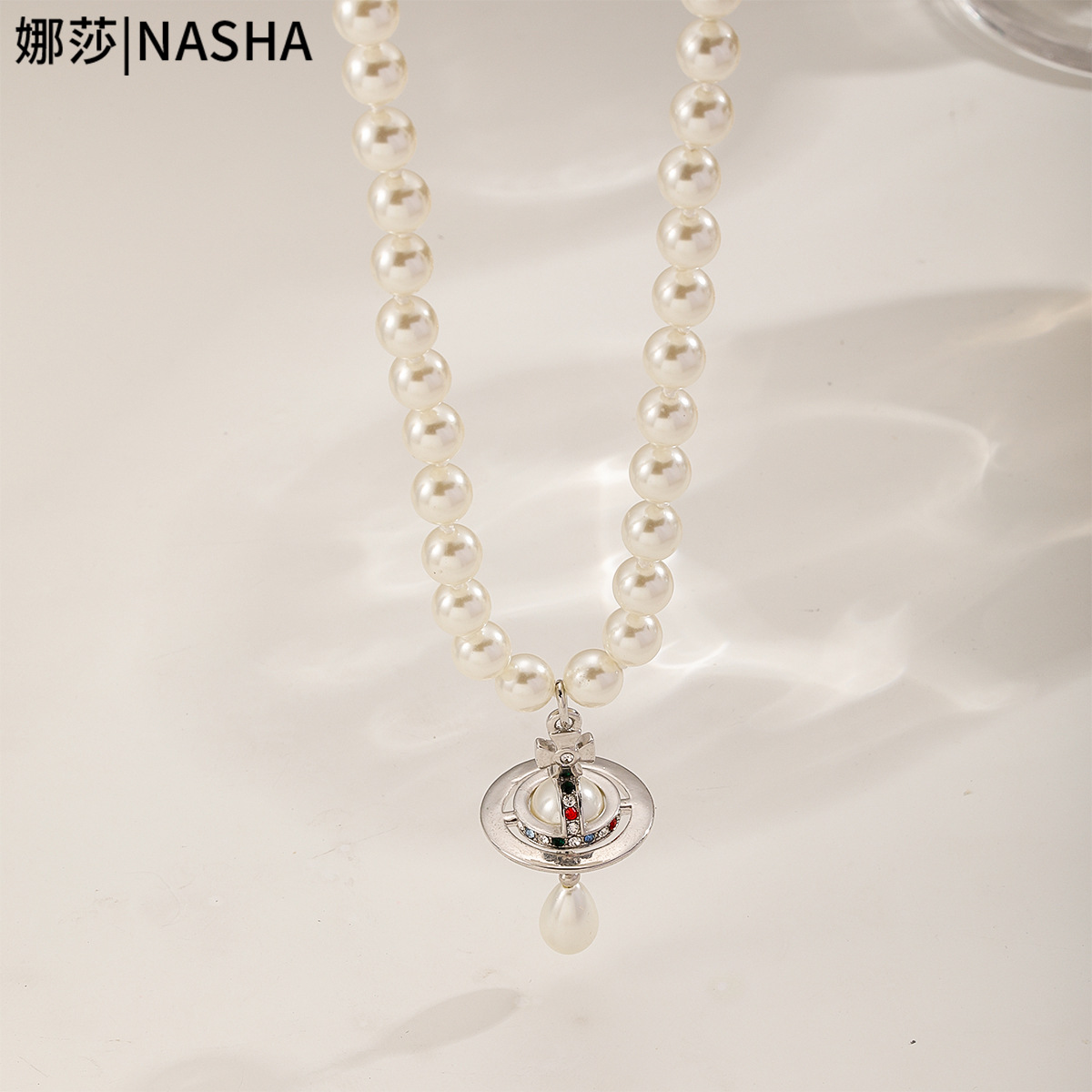 Empress Nassasi Saturn Three-dimensional Water Drop Baroque Pearl Necklace, long women's sweater chain, light luxury and high-end feel details Picture