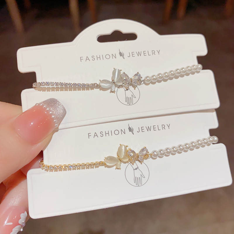Zircon cat's eye, butterfly and pearl patchwork bracelet, new, niche, high-end, fashionable and versatile, elegant jewelry wholesale