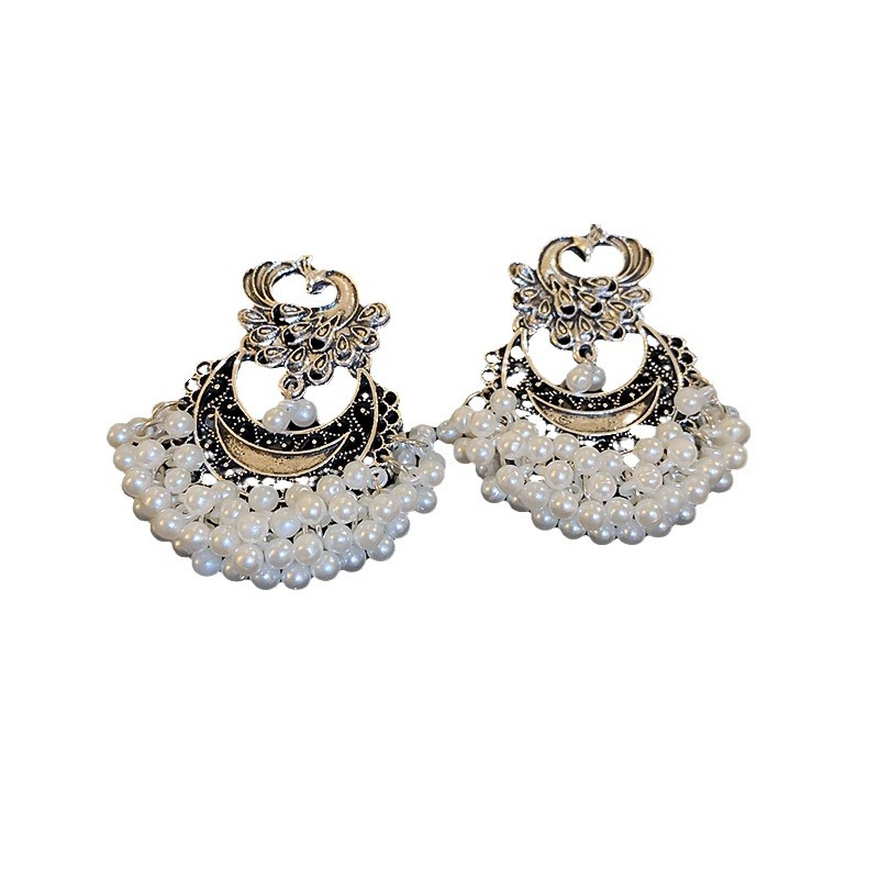 Silver needle retro diamond-encrusted water drop tassel earrings, new Chinese-style earrings with ethnic minority style, personalized and creative heavy industry earrings Item Picture