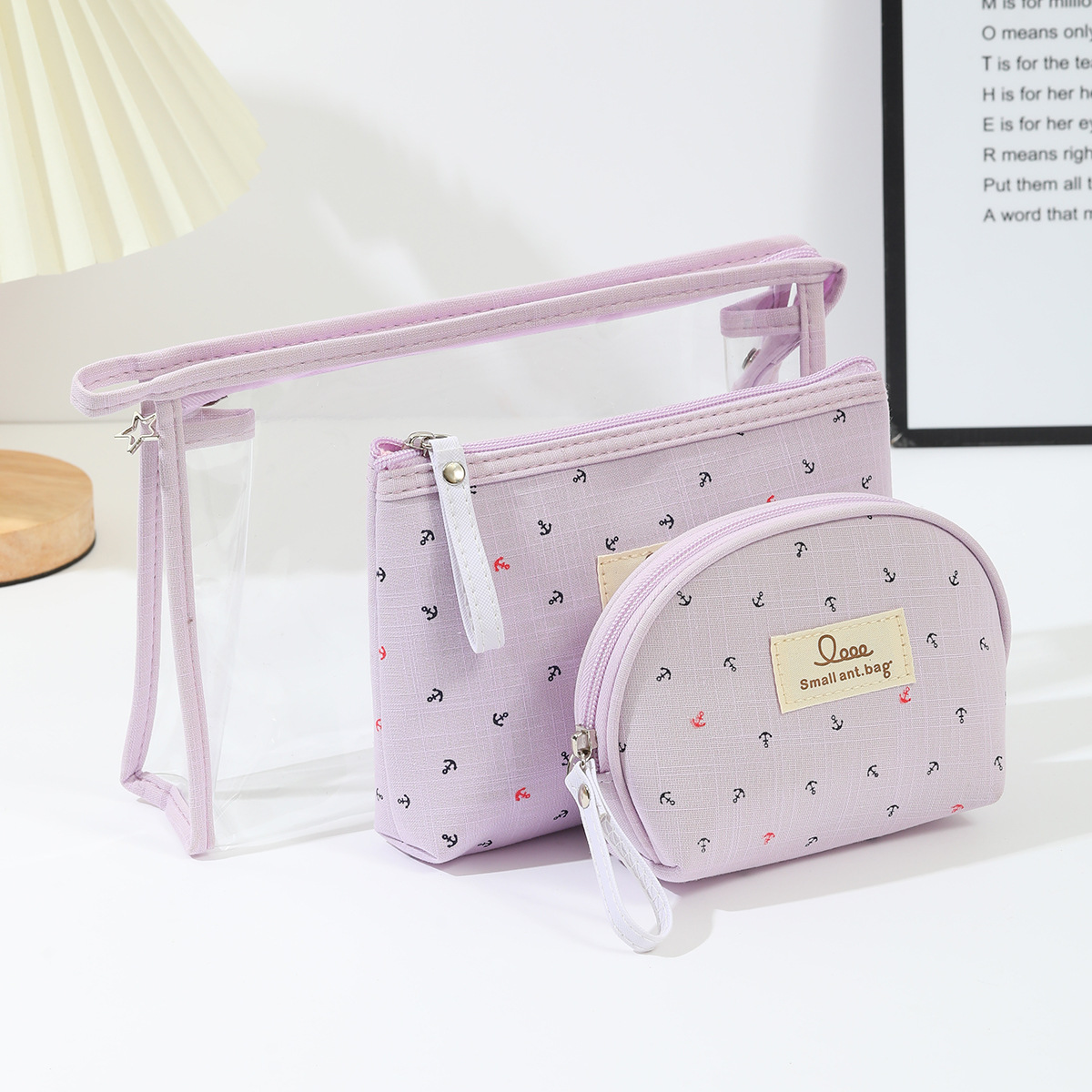 Wholesale of printed PVC transparent cosmetic bags, canvas three-piece sets, travel women's storage bags, makeup women's toiletries bags in stock details Picture